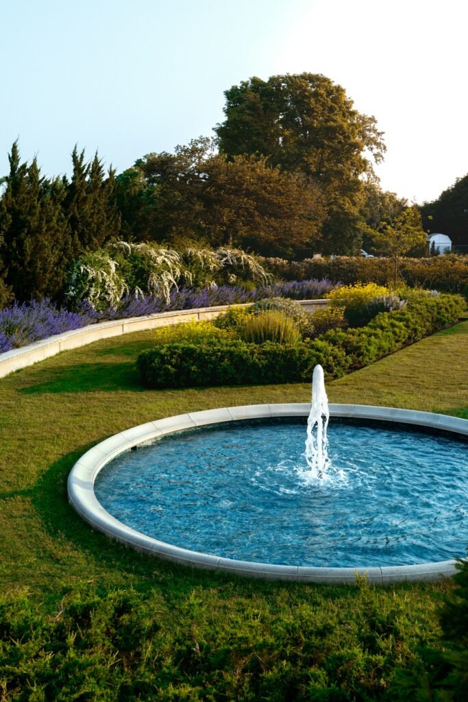 Garden fountain basin in a landscaped lawn