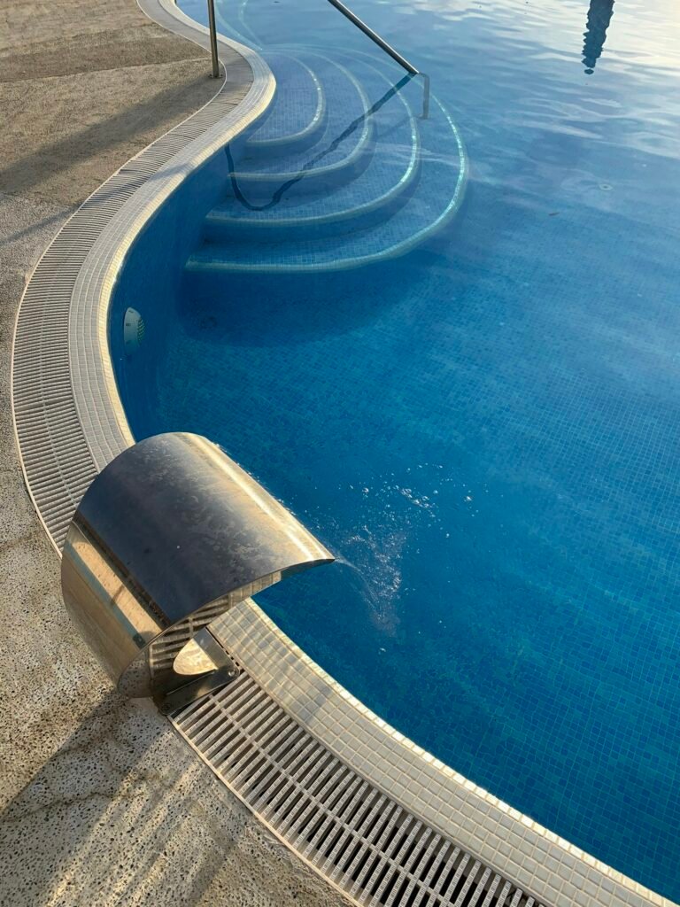 Pool return fitting with circulating water, part of pool equipment repair
