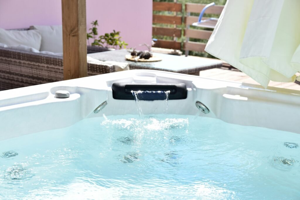Backyard spa with bubbling jets and clear water